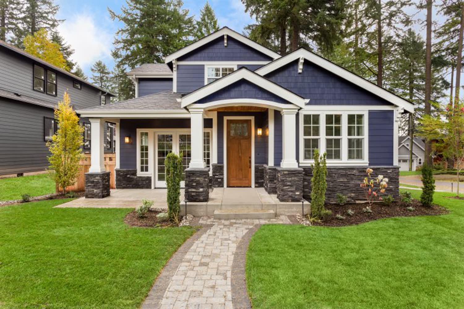 A home behind a healthy green lawn
